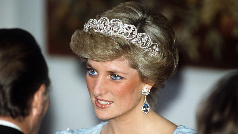 Closeup of Princess Diana greeting people while wearing a diamond tiara