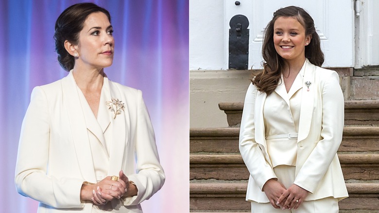 Princess Mary and Princess Isabella of Denmark in white suits