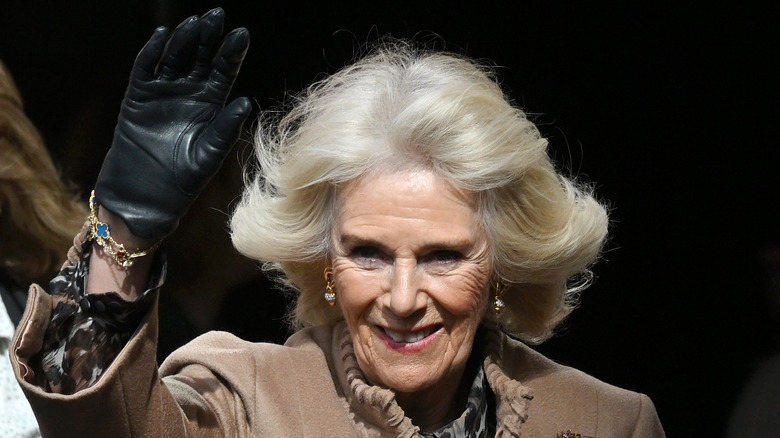 Queen Camilla waving at event