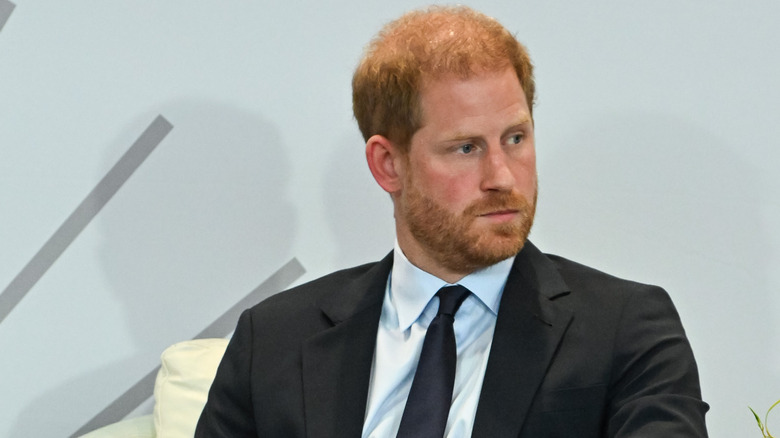 Prince Harry seated onstage