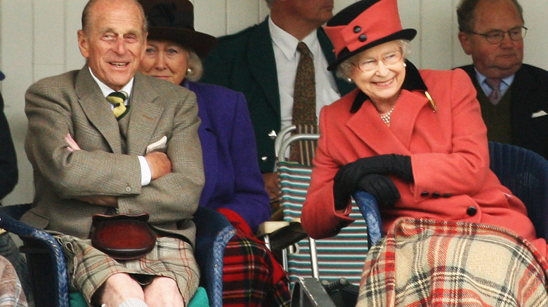 The queen and Philip giggle