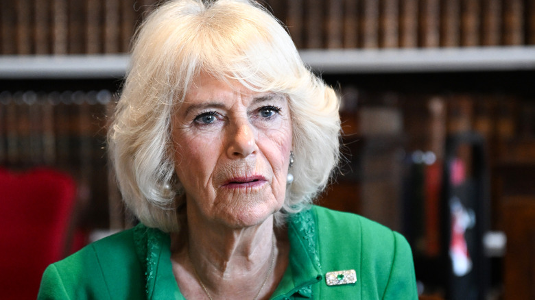 Queen Camilla wearing green