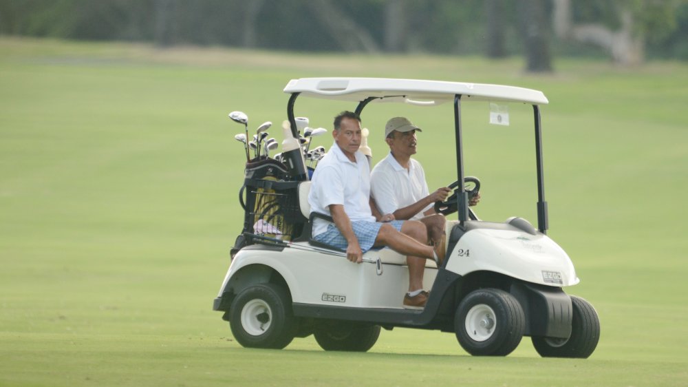 Obama in a golf cart