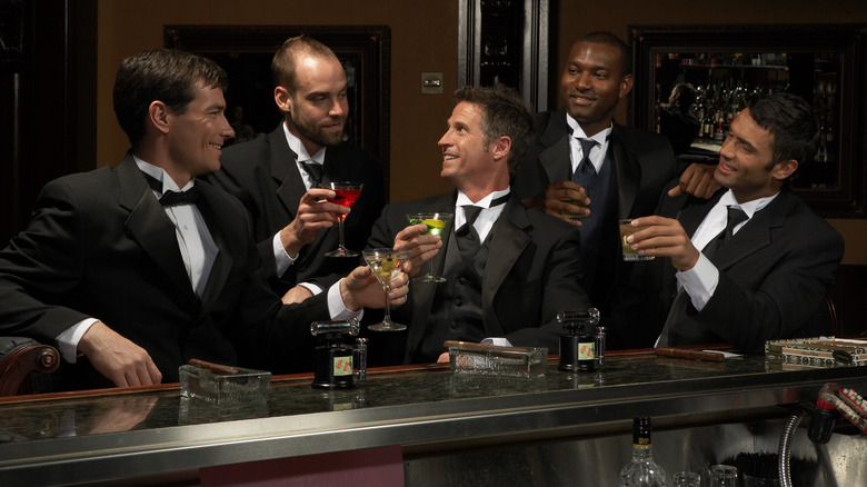 Group of men drinking