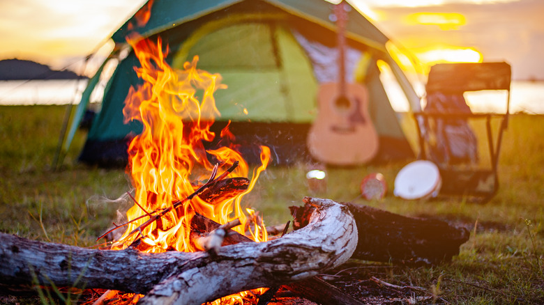 Camping tent and bonfire