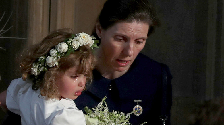 Maria Borrallo consoles crying flower girl