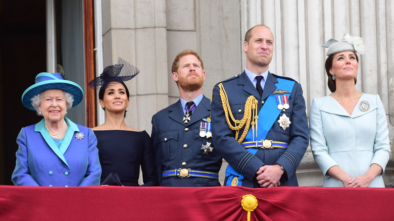 Queen Elizabeth with William, Harry, Kate, and Meghan