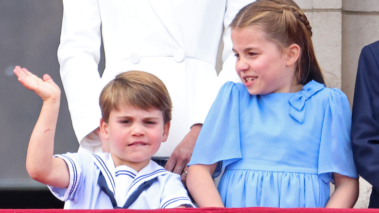 Prince Louis and Princess Charlotte making an appearance on the palace balcony