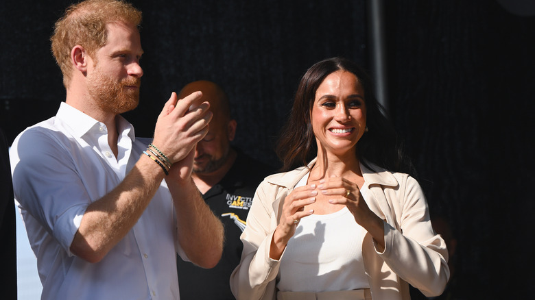 Harry and Meghan clapping