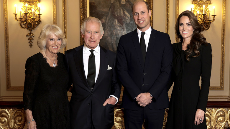 Royal family members Charles, Camilla, William, Kate