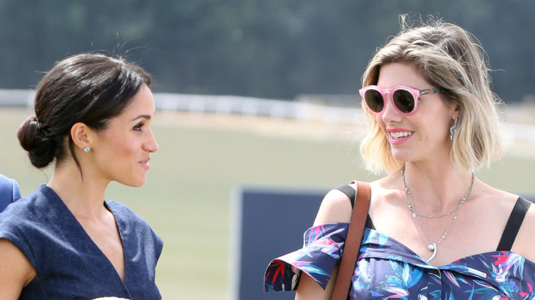 Meghan markle and Delfina Blaquier walking at the Sentebale Polo 2018