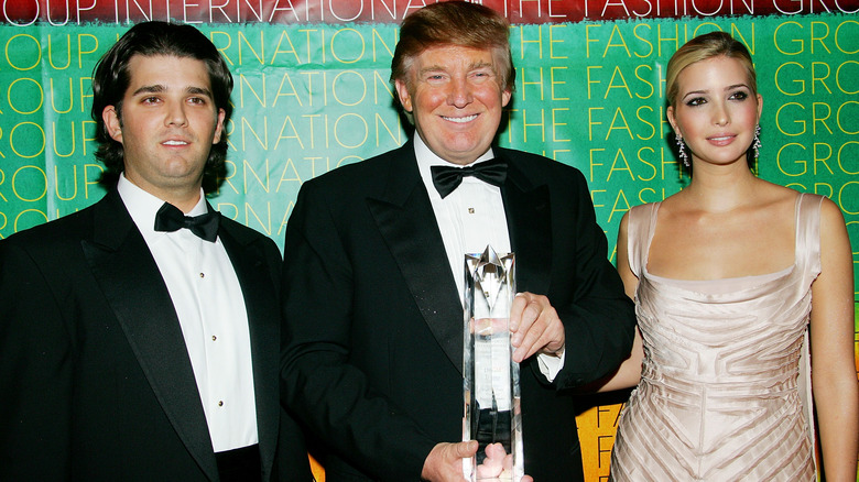 Young Donald Trump Jr. poses with Donald Trump Sr. and Ivanka Trump