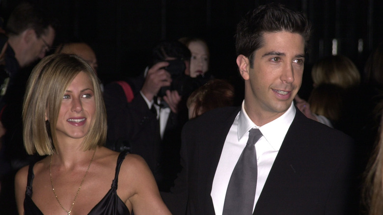 Jennifer Aniston and David Schwimmer smiling in a throwback picture