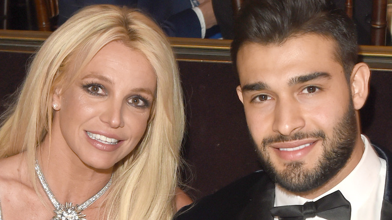 Britney Spears and Sam Asghari smiling 