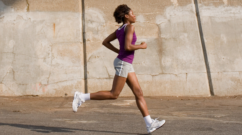 Woman running in workout clothes