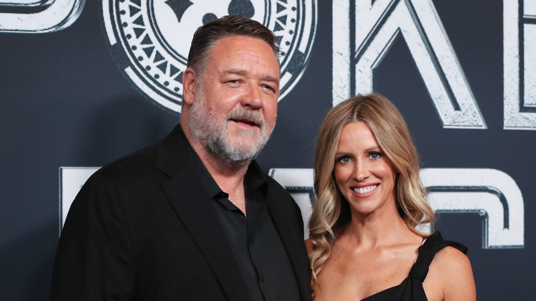 Russell Crowe and Britney Theriot smiling.