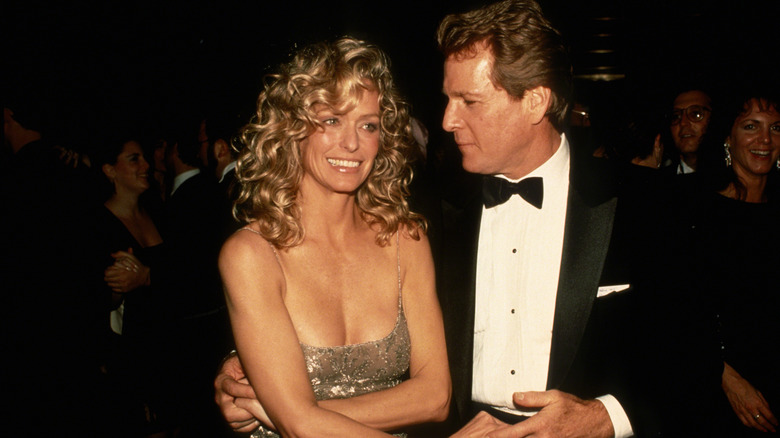 Farrah Fawcett and Ryan O'Neal at an event