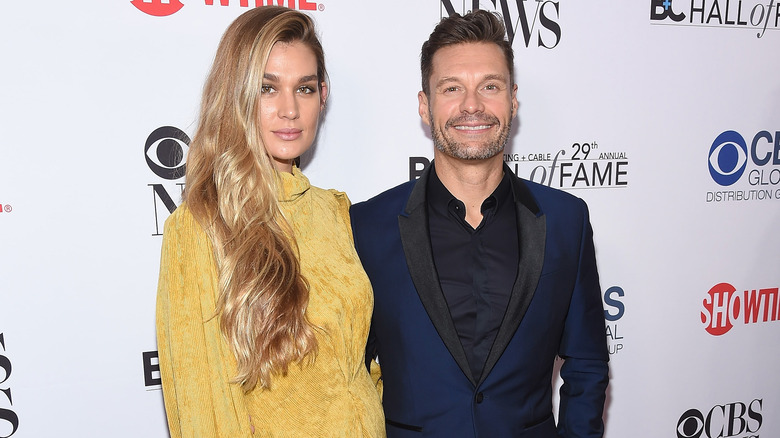 Shayna Taylor and Ryan Seacrest at event