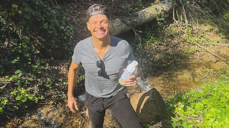 Ryan Seacrest in the woods