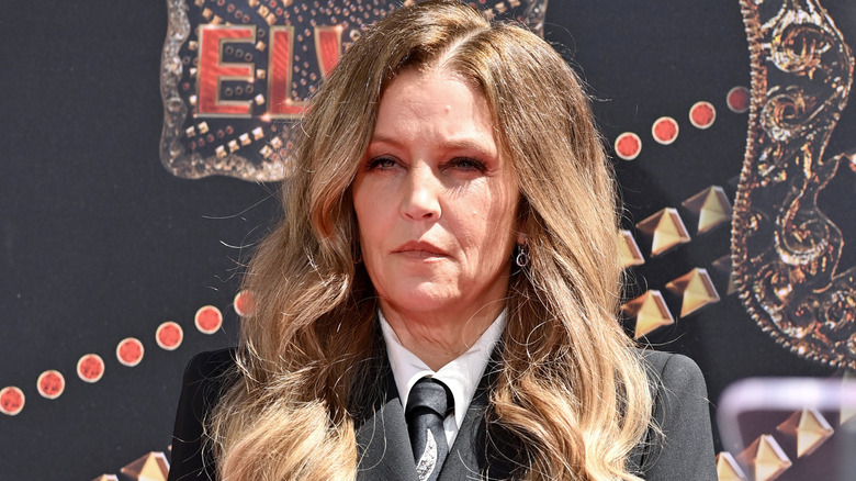 Lisa Marie Presley wearing suit and tie