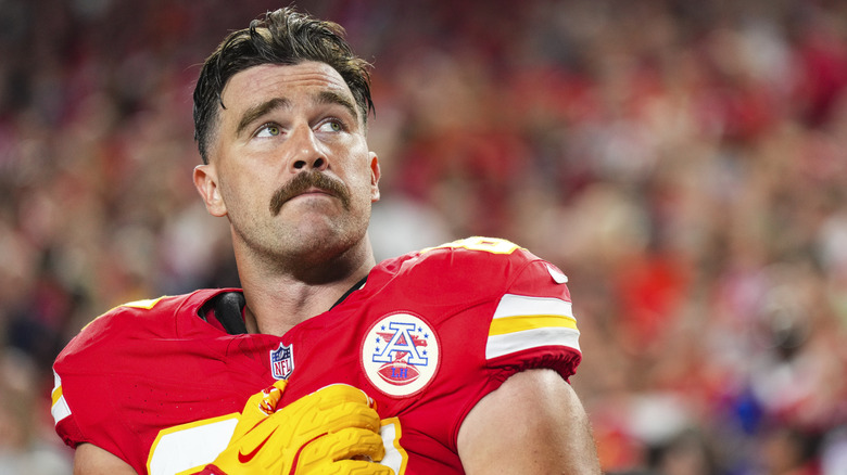 Travis Kelce looking up in Kansas City Chiefs uniform