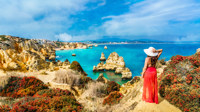 Woman looking at Portugal sea