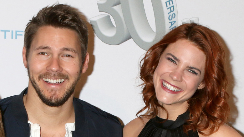 Scott Clifton and Courtney Hope smiling