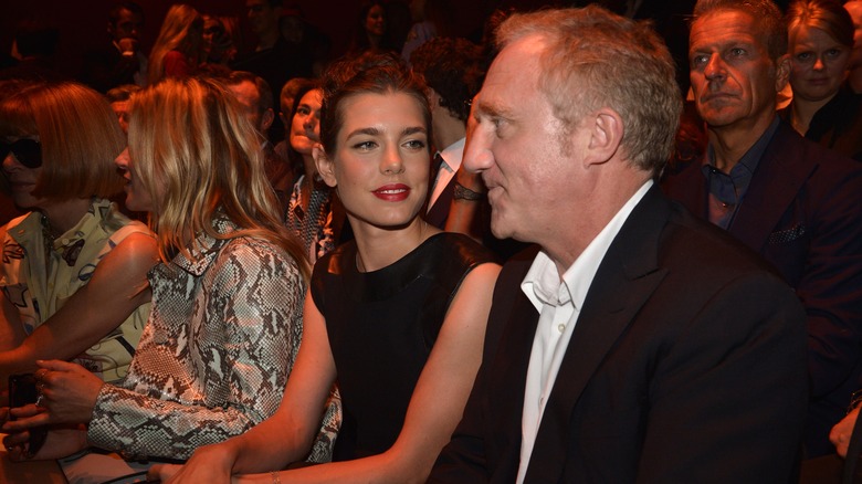 François-Henri Pinault and Kate Moss at runway show