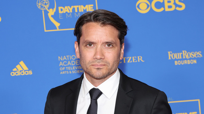 Dominic Zamprogna posing at an event