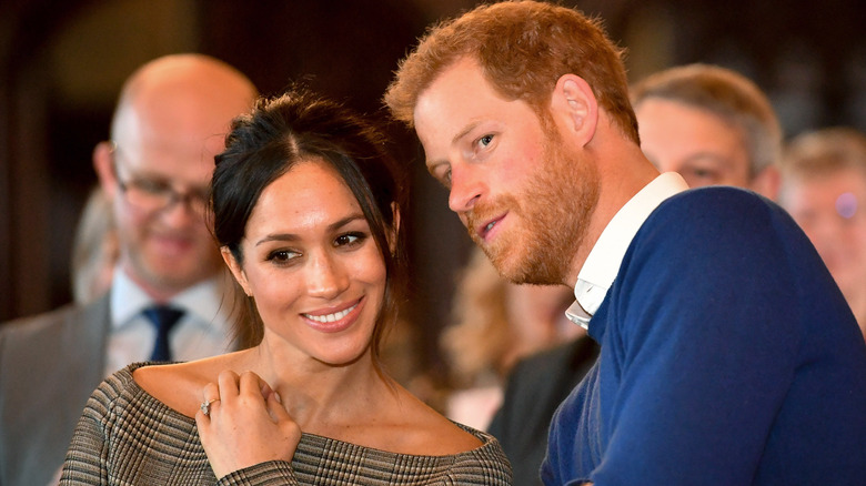 Prince Harry and Meghan Markle posing 