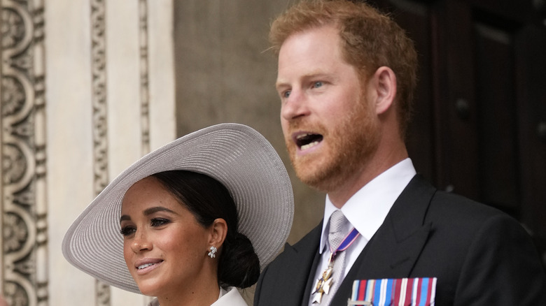 Prince Harry & Meghan Markle looking around