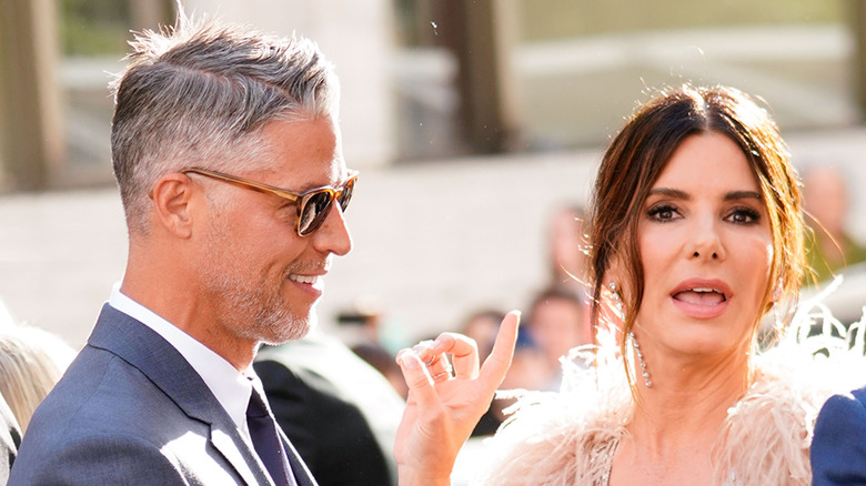 Bryan Randall and Sandra Bullock smiling