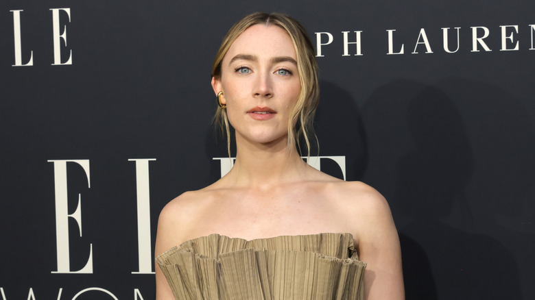 Saoirse Ronan poses at an event