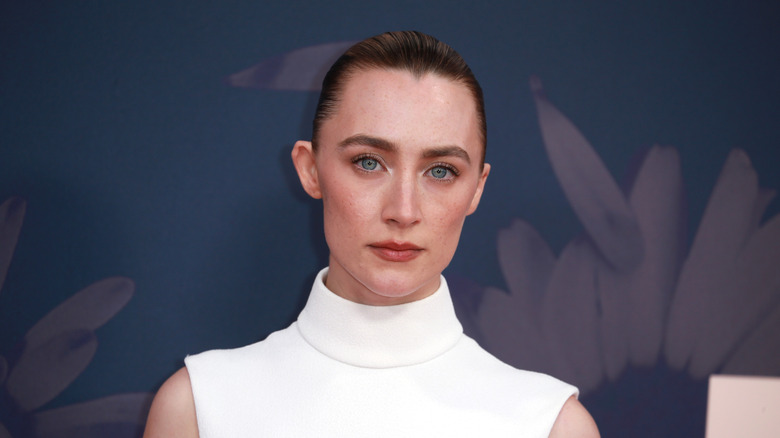 Saoirse Ronan looks into the camera