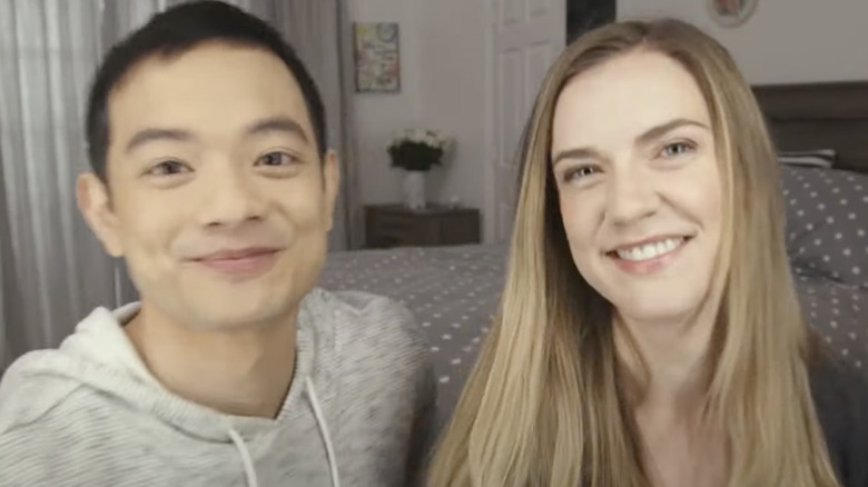 Sara Canning and Osric Chau smiling in Superhost