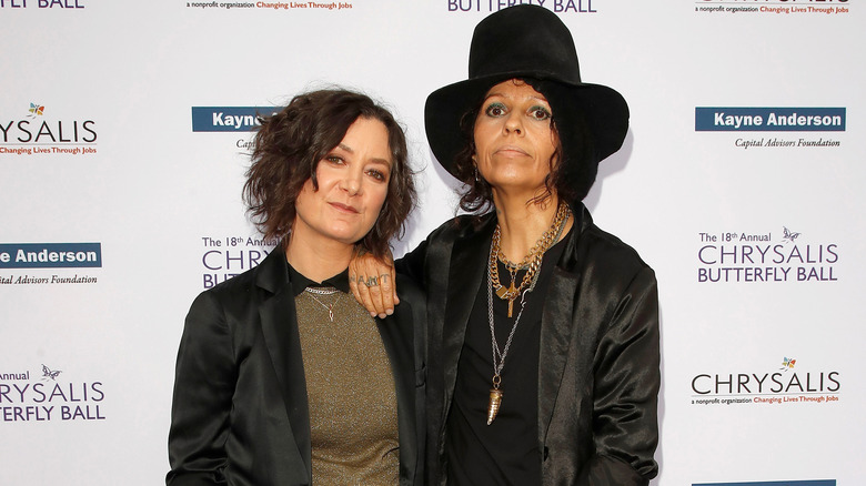 Linda Perry and Sara Gilbert posing