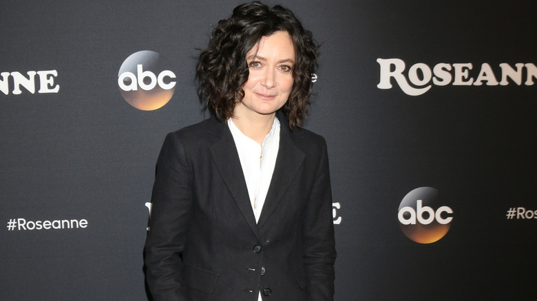 Sara Gilbert posing