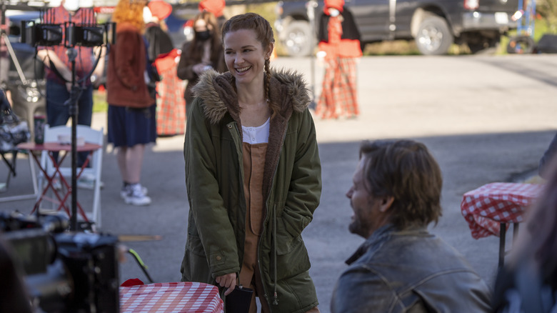 Sarah Drew laughing on set of Reindeer Games Homecoming