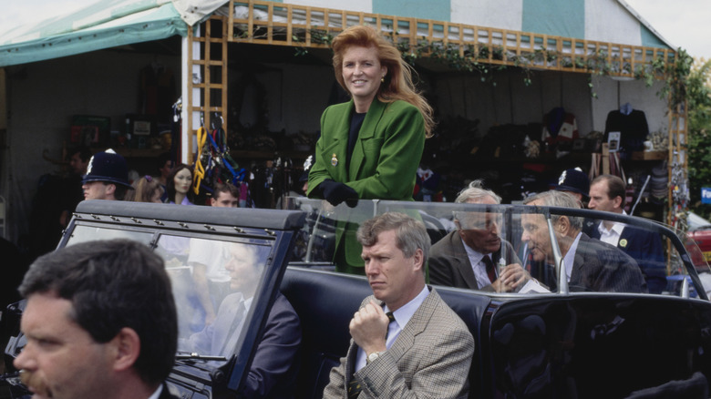 Sarah Ferguson smiling while in a car