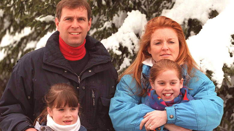 The Duke and Duchess of York pose for photographers while on Vacation In Verbier Switzerland with children Princess Beatrice and Eugenie February 19, 1999. 