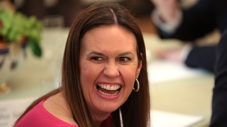 Sarah Huckabee Sanders laughing