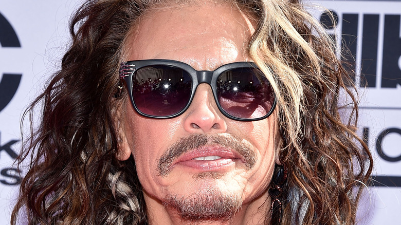 Steven Tyler wearing sunglasses