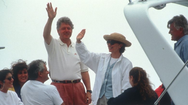 Clinton family waving from boat Martha's Vineyard