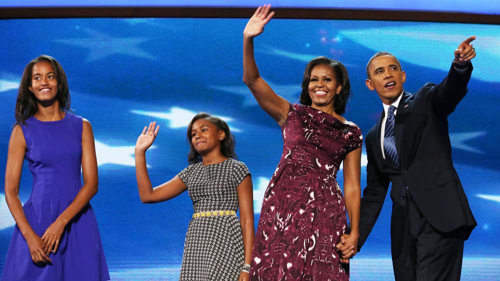 Sasha Obama on stage with her family