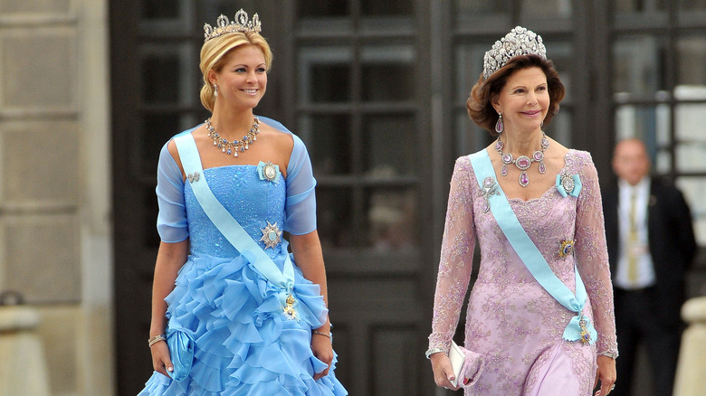 Queen Silvia and Princess Madeleine walking