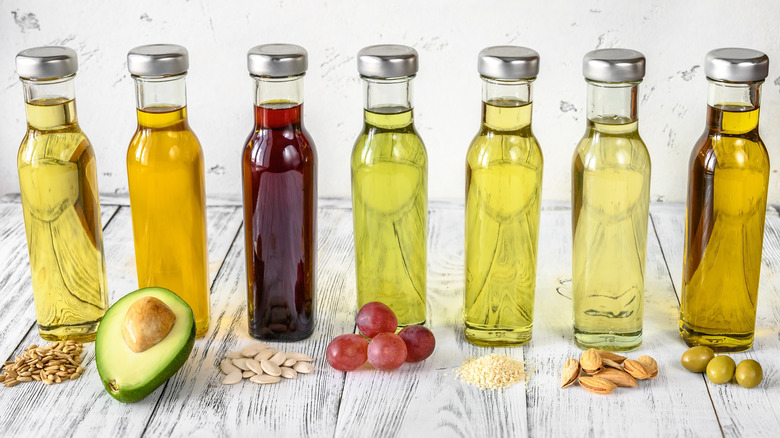 Assorted oils in glass bottles