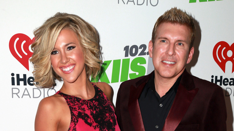 Savannah Chrisley and dad Todd Chrisley posing together