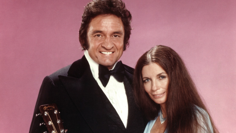 Johnny Cash and June Carter posing together