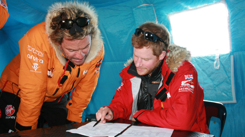 Dominic West and Prince Harry collaborate on the South Pole Allied Challenge in 2013.