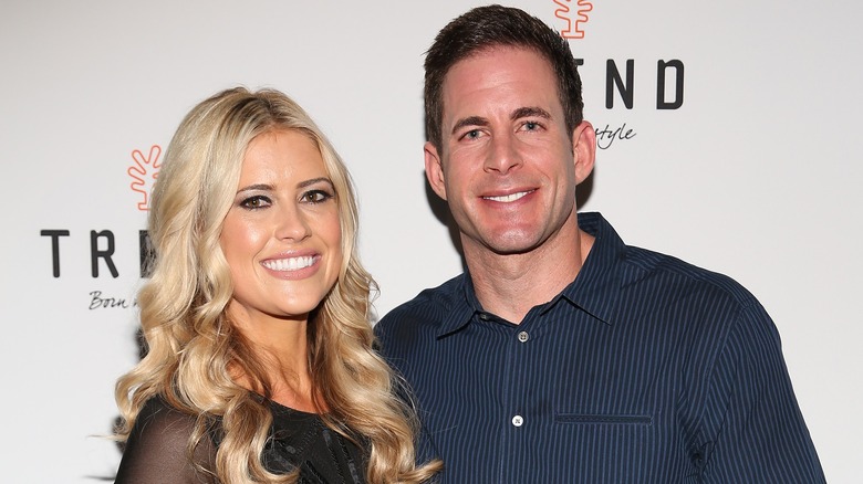 Christina Hall and Tarek El Moussa posing together as a couple